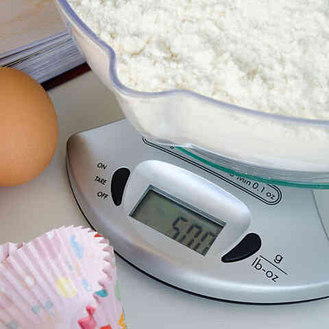Weighing scale with baking ingredients square