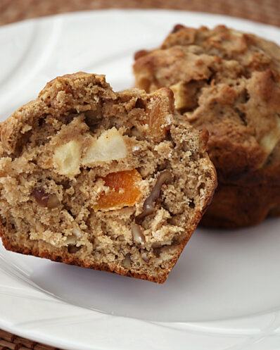Healthy Apple Apricot and Walnut Muffins in Basket 185117234 1255x837